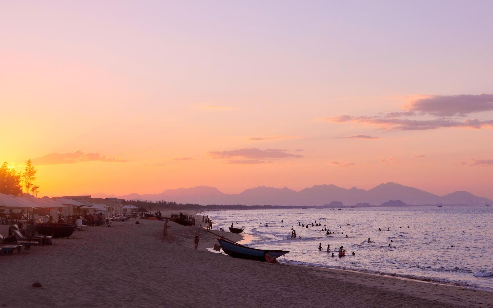 An Bang Beach Hoi An sunrise, fishing boats on shore